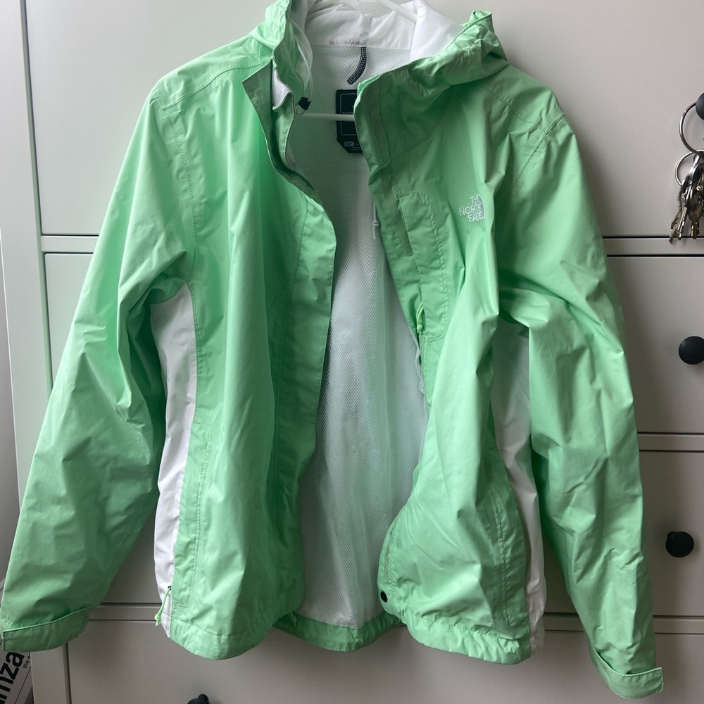 green North Face rain jacket is windbreaker